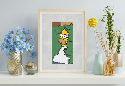 Framed artwork on a shelf with a flowers in the background