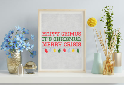 Framed print with 'Happy Grimus It's Chrismus Merry Crisis' text on a wall with decorative items.