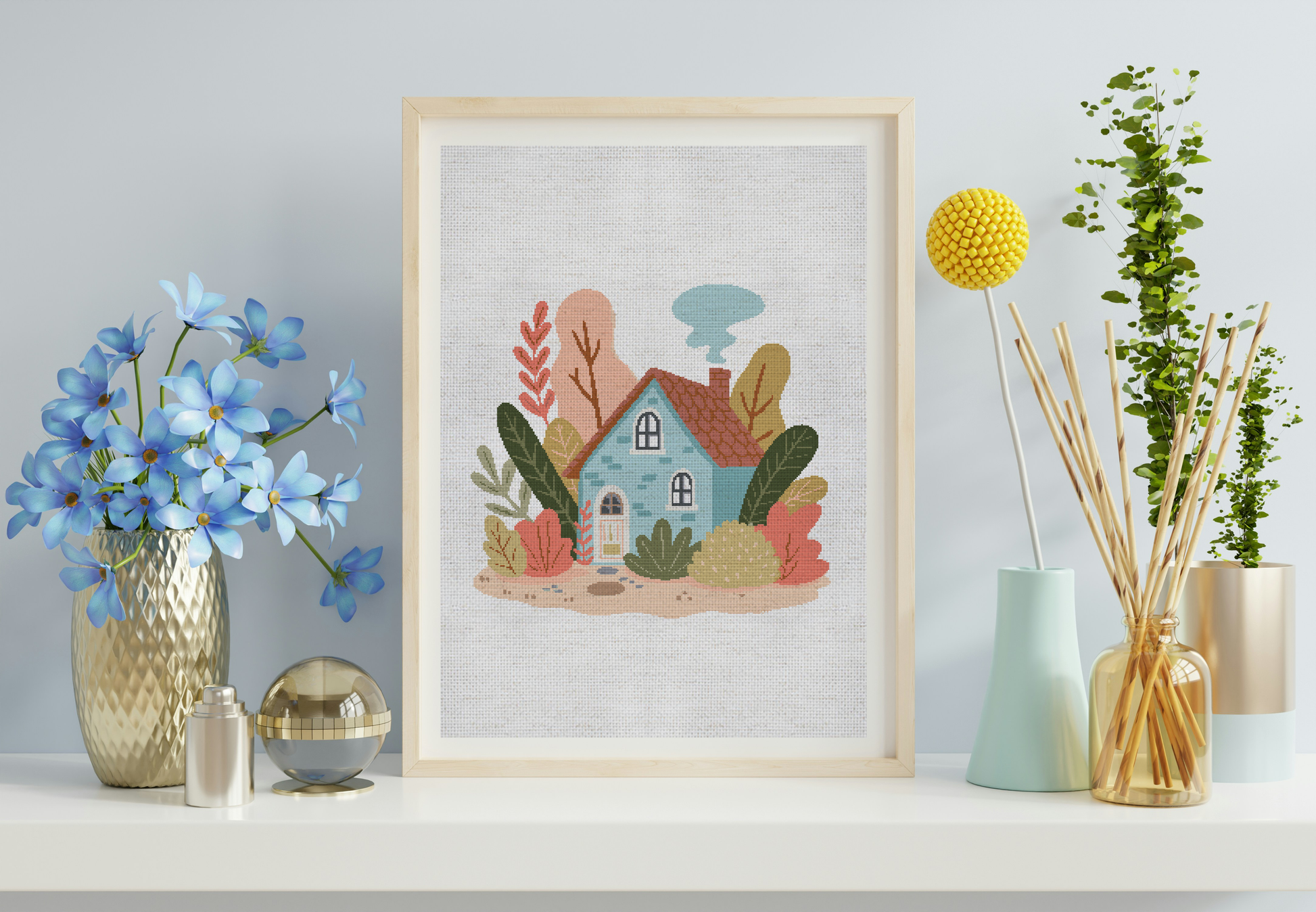 Framed artwork of a colorful house with plants on a shelf