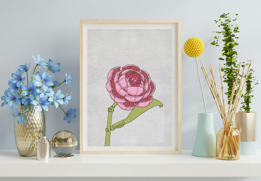 Framed floral artwork on a shelf with decorative items