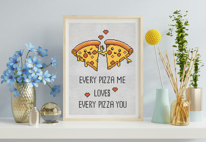 Cross-stitched pizza design with text in a wooden frame on a shelf with decorative items.