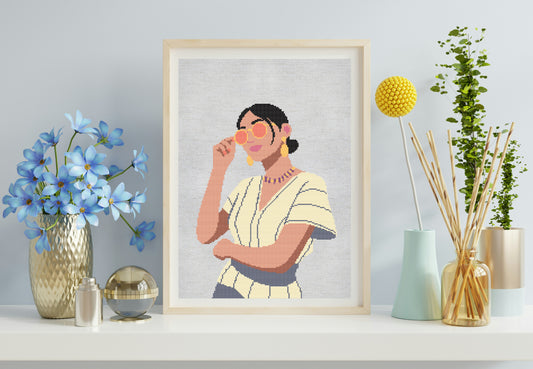 Framed artwork of a woman with flowers and decorative items on a shelf.