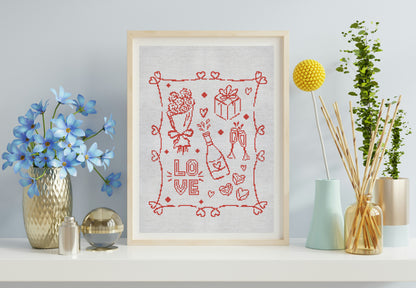 Framed artwork with red 'LOVE' design on a white background, surrounded by decorative items.