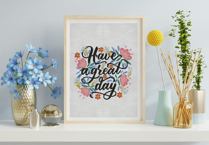 Decorative wall art with floral text design on a shelf with decorative items.