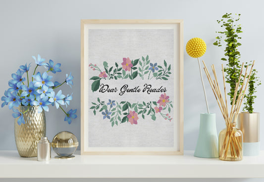 Framed artwork with floral design and text on a shelf with decorative items.