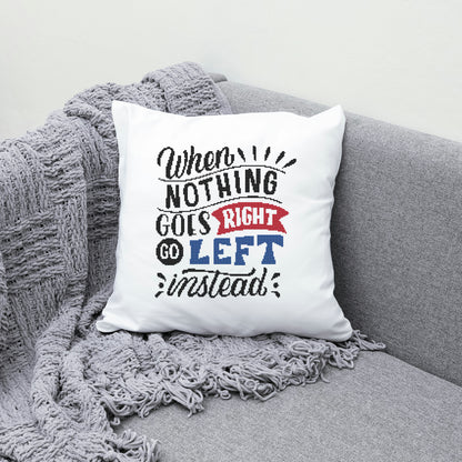 White pillow with humorous text on a gray couch