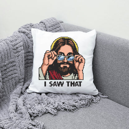 Pixelated pillow with a character holding sunglasses and 'I saw that' text on a gray couch.