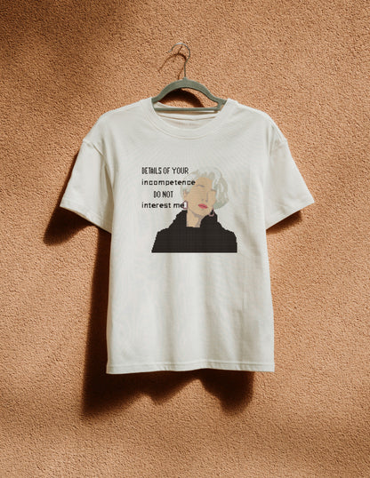 White t-shirt with graphic design and text on a beige background