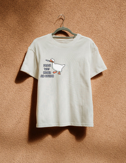 White t-shirt with a graphic design of a duck and text on a beige background